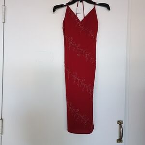 Elegant Red Evening Gown with Beaded Details